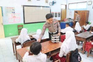 Polres Magetan Salurkan Makan Bergizi Gratis di Sekolah