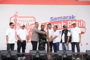 BRI Region 6 Meriahkan Pasar Malaka Rorotan, Dibuka dengan Simbolis Penumbukan Padi